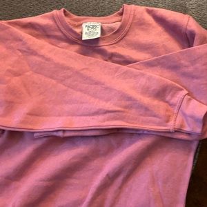 Medium sized pink crewneck.